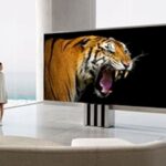 Porsche’s Wild 165-Inch Folding MicroLED TV Emerges From A Trapdoor And Prices A Mint